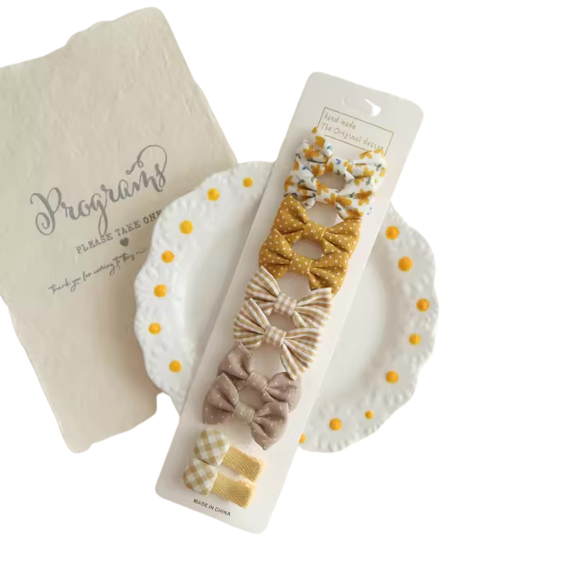 Bow hair clip - Yellows